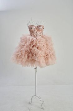 Blush Pink Cocktail Dress, Elopement Dress, Engagement Dress Blush tutu tulle dress with bustier top part. Dress is above knee and has lace up back. Made of embroidered tulle with sequins and pearls and soft tulle Such dress will be perfect for any special occasion. Dress can be tailored in different colors or color combinations, just contact me with your request. Fabric: Satin, tulle, lace Length of the dress can be made as you wish. Any changes of the design of the dresses are possible Sizes F Soft Tulle Dress, Pink Tulle Dress Short, Formal Dress Photoshoot, Blush Pink Homecoming Dress, Pink Puffy Dress, Puffy Prom Dress, Sparkly Bridesmaids, Sparkly Bridesmaid Dress, Puffy Prom Dresses