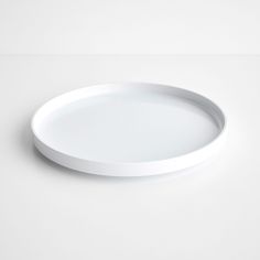 a white plate sitting on top of a table