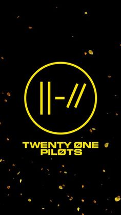 the twenty one pilots logo on a black background with gold confetti around it