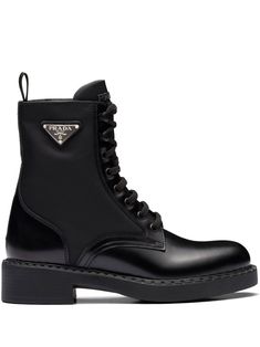 Brushed-Leather ankle boots from PRADA featuring black, leather, recycled nylon, brushed effect, ankle-length, logo plaque, round toe, front lace-up fastening, pull-tab at the heel and flat rubber sole. Knee High Sneakers, Motorcycle Boot, Hiking Shoes Women, Leather Biker Boots, Ankle Boots Men, Winter Ankle Boots, Leather Lace Up Boots, Combat Boot, Martin Boots