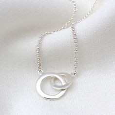 PRODUCT DESCRIPTION * A classic gold vermeil or sterling silver infinity rings necklace. * Personalised with an optional charm it makes a treasured bespoke gift. * A matching bracelet is available. PERSONALISATION * We engrave our pieces to create bespoke items especially for you, we are always happy to try and help if something is unsuitable but we regret we are unable to offer refunds on personalised items. FREE GIFT BOX * This necklace comes beautifully packaged in our Hurleyburley gift box. Friends Or Lovers, Linked Rings, Infinity Rings, Silver Infinity Ring, Interlocking Rings, Interlocking Ring, Modern Necklace, Eternity Rings, Rings Necklace