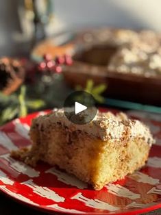 a piece of cake on a red and white plate