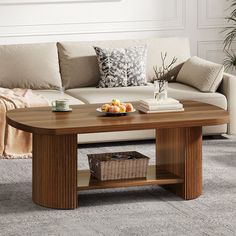 a living room with a couch, coffee table and baskets on the floor in front of it