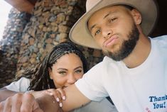 a man and woman sitting next to each other