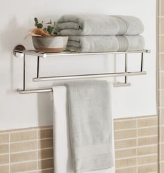 two towels and a bowl on a towel rack