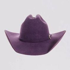 Introducing the Cattleman Womens Felt Cowboy Hat, a true iconic Cattleman-shaped crown with a shovel brim for that Yellowstone Dutton Ranch Hat look. Offered by American Hat Makers means that you can rest easy because it is backed by our 50 years of experience and Lifetime Guarantee. Featuring a sewn-in sweatband with a unique hidden pull strap tightening system for a one of a kind fit! Plus we’ll include two adhesive size reducers for an even more custom experience. Brim 4" Crown 4 3/4" Midweig Colored Felt Cowboy Hats, Purple Cowboy Hat, Tropical Goth, Ranch Hat, Lane Frost, White Cowboy Hat, Brown Cowboy Hat, Yellowstone Dutton Ranch, Felt Cowboy Hat