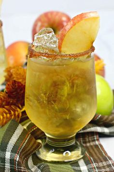 an apple cider is garnished with ice