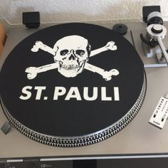 a record player with a skull and crossbones on it