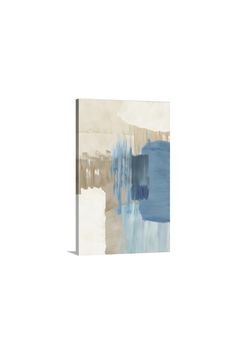 an abstract painting with blue and beige colors on the canvas, it looks like something out of