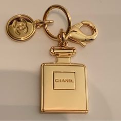 An Exclusive Chanel Miniature Gold Tone Charm. Released 2023. See All Photos For Additional Details. Chanel Keychain, Chanel Charm, Bow Keychain, Mini Gold, Chanel Mini, Couture Accessories, Hot Nails, 2024 Vision, Wide Belt