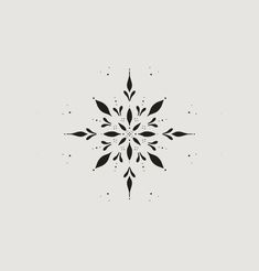 a black and white snowflake on a gray background