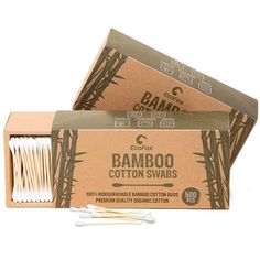 two boxes of bamboo cotton swabs on a white background