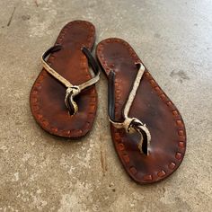 All leather with woven detail. made in Italy. Size 8.5. Mint condition! Brown Leather Braided Sandals, Brown Open Toe Sandals With Leather Trim, Casual Braided Leather Sandals, Leather Sandals With Round Toe And Leather Trim, Woven Leather Sandals For The Beach, Vacation Braided Leather Sandals, Beach Sandals With Woven Leather, Beach Sandals In Woven Leather, Woven Leather Huarache Sandals