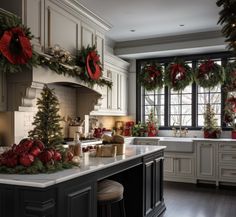 a kitchen decorated for christmas with wreaths and garland