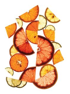 sliced oranges and lemon slices arranged in a circle