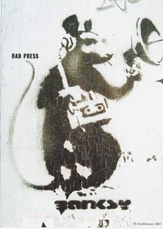 a black and white photo of a rat with the word bad press written on it