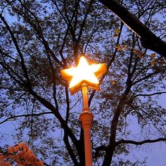 a street light that has a star on it