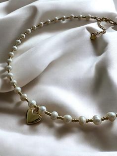 Bride jewelry~Wedding necklace~Bridal pearls necklace~Wedding Jewelry~ Dainty Pearl Necklace with heart~ Bridesmaid Gifts~18k gold necklace FIND MATCHING BRACELET HERE : https://www.etsy.com/listing/1768478444/ Elegant Freshwater Pearl Necklace with 18K Gold-Plated Heart Pendant - Perfect Bridal & Bridesmaids Gift Celebrate love and elegance with our stunning Freshwater Pearl Necklace, adorned with an exquisite 18K gold-plated heart pendant. This timeless piece is the perfect accessory for bride Pearl Necklace With Heart, Dainty Pearl Necklace, Necklace With Heart, Bridal Pearl Necklace, 16 Inch Necklace, Pearl Necklace Wedding, Bride Jewelry, 18k Gold Necklace, Necklace Bridal