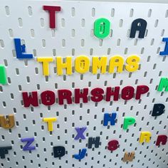 there are letters and numbers on the pegboard to spell out what's in the word