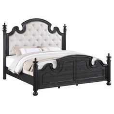 a bed with an upholstered headboard and foot board