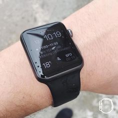 an apple watch on someone's arm showing the time