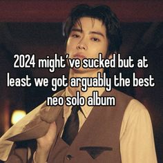 a man wearing a vest and tie with the words, 2012 might't we sucked but at least we got actually the best neo solo album