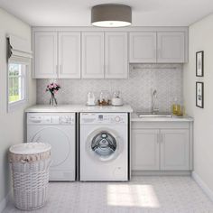 a washer and dryer in a white laundry room