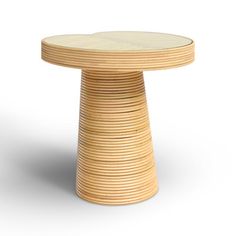 a round wooden table with a white top on a white background in the shape of a spiral