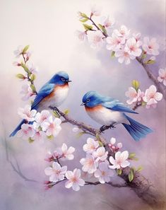 two birds are sitting on a branch with flowers