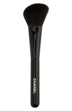 What it is: An angled powder brush. What it does: It's ideal for setting loose and pressed formulas, as well as sculpting cheeks and facial contours.- Made in France Chanel Makeup Bag, Makeup Collection Goals, Eye Makeup Designs, Chanel Makeup, Dior Makeup, Foundation Shades, Contour Brush, Makeup Items, Makeup Designs