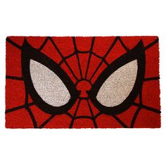 a door mat with a spiderman face on it