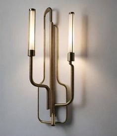 a wall light that has two lights on it