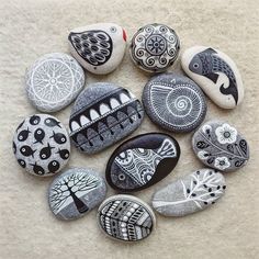 some rocks with different designs on them