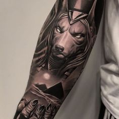 a man with a tattoo on his arm