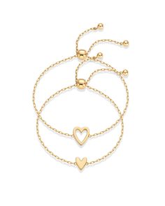 PRICES MAY VARY. Celebrate love and friendship with our besties bracelets set! Each set includes two stylish 9" bracelets, one featuring a dainty 8mm x 6.8mm small heart and the other boasting a charming 11.8mm x 10mm open heart. Perfect for Valentine's Day, anniversaries, or just to show appreciation, these adjustable slider bracelets are ideal for both women and men. Our bracelet is crafted with 14k yellow gold plating that adds a long-lasting finish. And guess what? It's 100% nickel-free, cad Trendy Gold Friendship Bracelets For Valentine's Day, Gold Heart-shaped Friendship Bracelets For Valentine's Day, Trendy Heart Bracelet For Friendship, Trendy Adjustable Double Heart Jewelry, Trendy Everyday Heart Bracelet For Valentine's Day, Yellow Gold Heart Charm Bracelet For Friendship, Gold Heart-shaped Friendship Bracelets, Gold Heart Bracelets For Friendship, Heart-shaped Gold Bracelets For Friendship