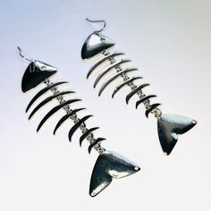 Super cute fishbone dangle drop earrings. Not intended for children ages 13 and under. Also, for many items we can accommodate large orders, so please send us a message. Fish Bone Jewelry, Fish Skeleton, Skeleton Earrings, Bone Earrings, Choker Collar Necklace, Bone Jewelry, Costume Necklaces, Fashion 2024, Choker Collar