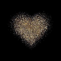 a heart made out of small gold glitters on a black background in the shape of a heart