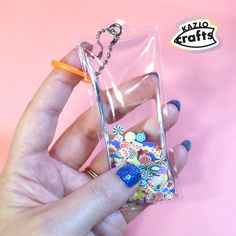 PLEASE READ BEFORE PURCHASING Swish confetti back and forth for a calming effect and use as a little extra flair for keys or bags. This fidget keychain is made with oil and clay confetti bakery goods, spirals, and rainbows sealed in a vinyl pouch.  - Will include a grommet with a beaded keychain and claw attachment - Size of Pouch: 2.875" w x 4.25" h (Height dimension is measured from top of the Grommet tab to the bottom seal) NOT INTENDED FOR CHILDREN UNDER THE AGE OF 7. CHOKING HAZARD FOR TODDLERS. PARENTAL SUPERVISION IS ADVISED. THESE ARE HANDMADE ITEMS THAT MAY HAVE SLIGHT IMPERFECTIONS AND VARIATIONS. THESE ARE NOT MADE IN A FACTORY AND ARE NOT MASS PRODUCED. Back to kazlographics.etsy.com Fidget Keychain, Vinyl Pouch, Shaker Keychain, Bakery Goods, Beaded Keychain, Confetti, Handmade Items, Pouch, Vinyl