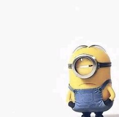 a minion holding a magnifying glass in front of it's face