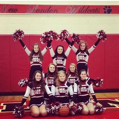 the cheerleaders are posing for a photo