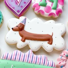 decorated cookies with dogs and hearts on them