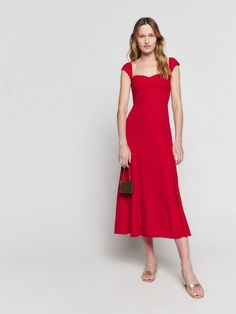 Wear the dress. Shop the Bryson Dress from Reformation, a midi dress with short, cap sleeves, a sweetheart neckline and an A-line silhouette. Midi Dress For Women, French Retro, Christmas Party Outfits, Red Square, Reformation Dress, Silky Dress, A Line Dresses, Grad Dresses, Red Midi Dress