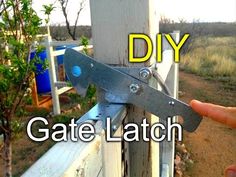 a hand holding a gate latch with the words diy on it and an image of a