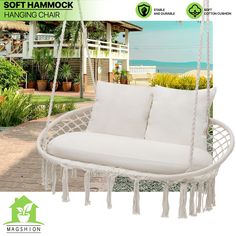 a white hanging chair with tassels on the front and back sides, along with an advertisement for soft hammock hanging chair