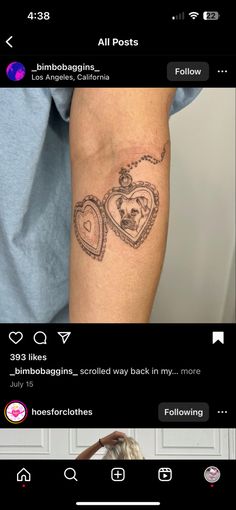 a woman with a heart tattoo on her arm