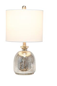 a table lamp with a white shade on it's base and a gold finish