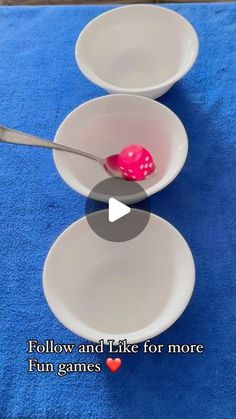 two white bowls with red dices in them on a blue table cloth and the words follow and take for more fun games