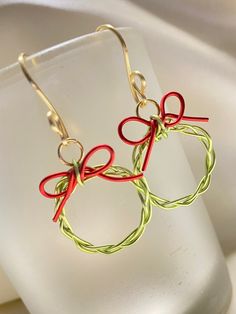 pair of red and green wire wrapped earrings