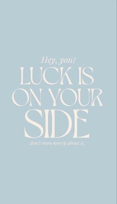 a blue and white poster with the words, hey you luck is on your side