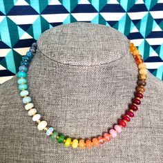 These fun, trendy, rainbow gemstone necklaces are great to wear all summer and makes an original gift. It adds a pop of color to outfits too. Choose from styles 1-10. Each one is truly unique, but made as close as possible to the photos. It's REVERSIBLE: wear with lock in the back or in the front and add a charm! You can attach a different necklace for a longer look. Bracelet colors are random, but if ordered with a necklace set, will try to coordinate colors. Message to customize your own or ad Rainbow Faceted Beads Necklace For Gift, Adjustable Rainbow Crystal Necklace With Faceted Beads, Adjustable Rainbow Jewelry For Everyday, Everyday Rainbow Jewelry With Round Beads, Everyday Rainbow Round Bead Jewelry, Trendy Multicolor Jewelry With Natural Stones, Rainbow Gemstone Beaded Necklaces For Gift, Rainbow Necklaces With Spacer Beads For Jewelry Making, Rainbow Gemstone Beaded Necklaces As A Gift